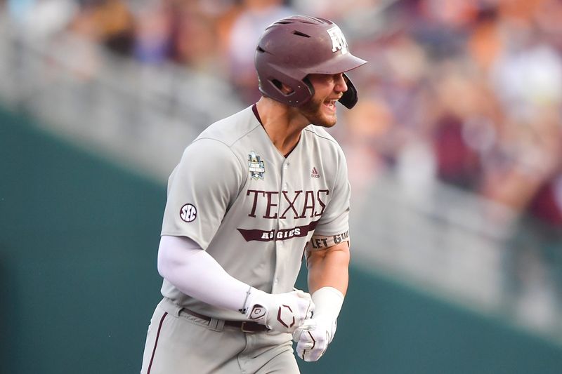 Texas A&M's Gavin Grahovac (9) celebrates a home run during a NCAA College World Series game between Tennessee and Texas A&M at Charles Schwab Field in Omaha, Neb., on Saturday, June 22, 2024.