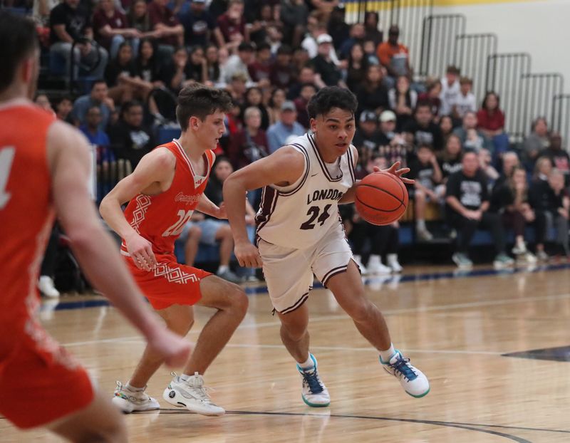 London's Christian Olivares drives past his defender during the Class 3A Division I state semifinal against Orangefield on Tuesday, March 10, 2026, at Bay City High School.