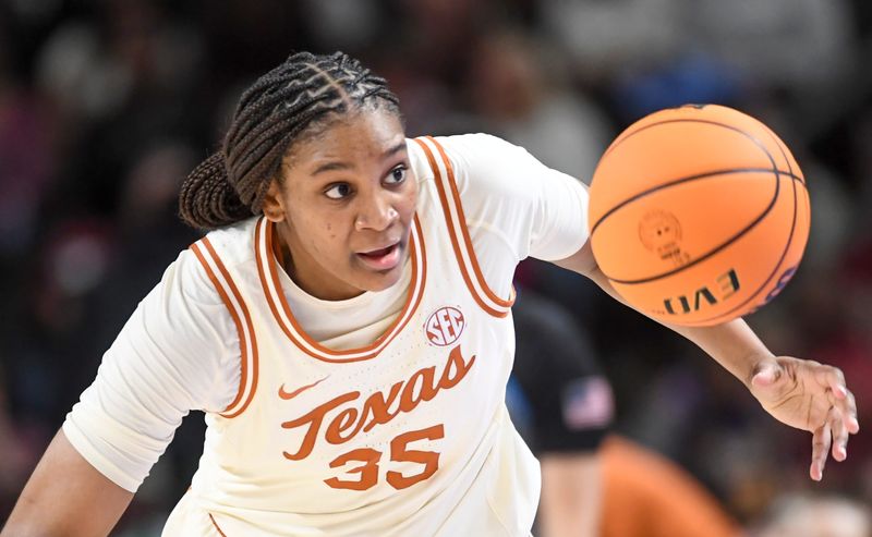Texas Longhorns forward Madison Booker (35) goes for a loose ball Saturday, March 7, 2026, during the SEC Women's Basketball Tournament semifinals game against the Ole Miss Rebels at Bon Secours Wellness Arena in Greenville, South Carolina.