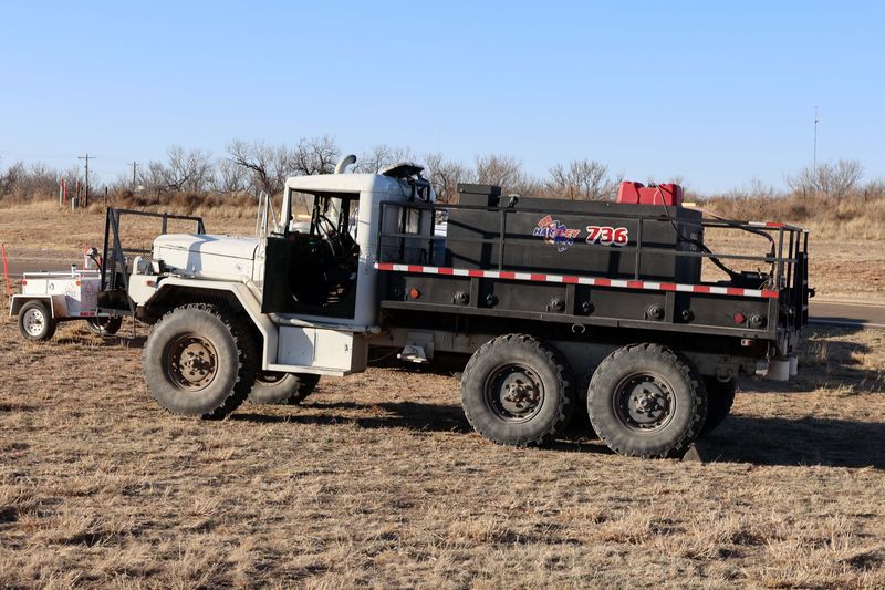 In this file photo, a Grass Firetruck from the Hartley Fire Deptment sits ready to go at the staging area at the entrance to Boys Ranch in March to help with the Yellow Fire near Boys Ranch.