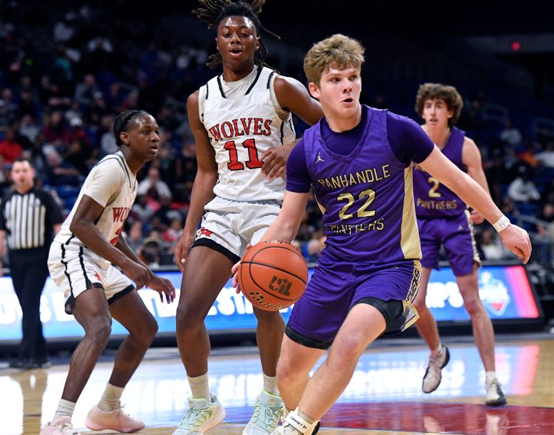 Panhandle guard Caden Armes plays looks for a teammate to pass as San Augustine players close in during the Class 2A Div. 1 basketball state championship in San Antonio Thursday March 12, 2026. Final score was 61-58, Panhandle.