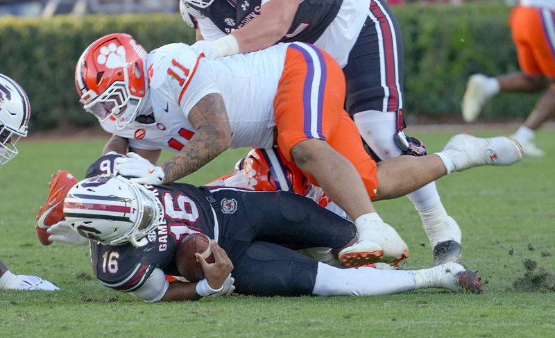 Clemson defensive lineman Peter Woods (11) sacks South Carolina quarterback LaNorris Sellers (16) after the Tigersâ€™ 28-14 win at Williams-Brice Stadium in Columbia, S.C. Saturday, November 29, 2025.