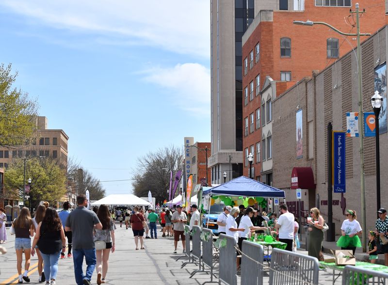 Vendors line Indiana Ave., during the St. Patrick's Day Downtown Street Festival, on Saturday, March 14, 2026, in Wichita Falls. The all-day event was hosted by Downtown Wichita Falls Development, where the community could enjoy a 5K run, live music, food, drinks, and vendors.