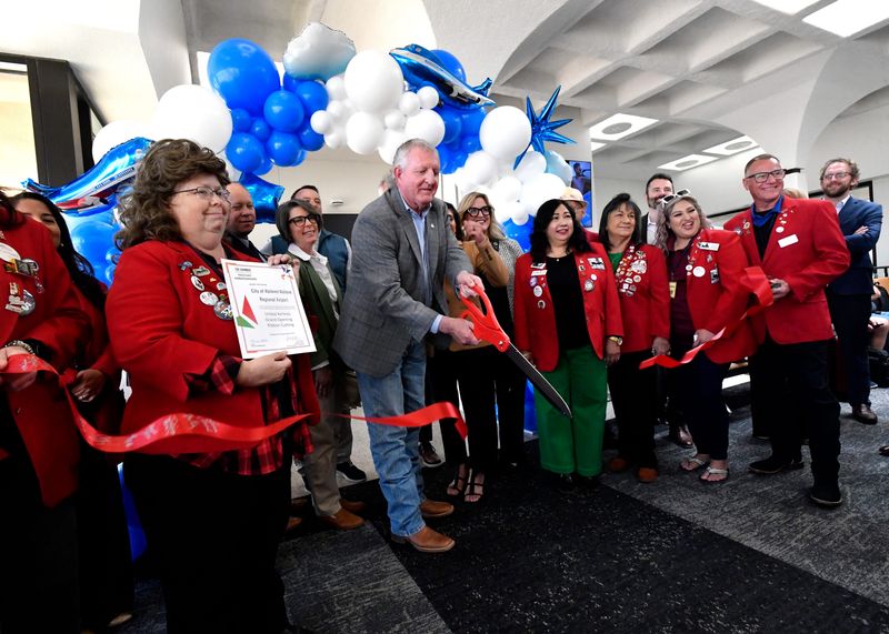 Mayor Weldon Hurt and the Abilene Redcoats cut the ribbon on the new Sky West Airlines United Express service to Denver and Houston from Abilene Regional Airport on Tuesday, March 17, 2026.