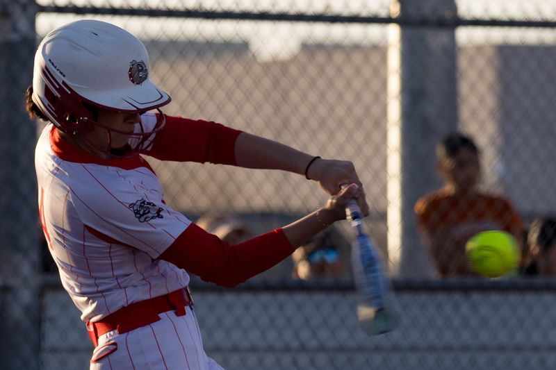 Socorro’s Danielle Lozoya (4) hits the ball during a District 1-6A game against Eastlake at Eastlake High School on Tuesday, March 17, 2026, in El Paso, Texas.