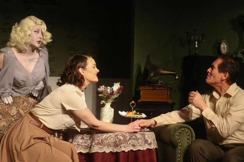 From left, Mariah Treadwell, Kalea Bennett and Joe Martinez perform during a production of "Blithe Spirit" at Aurora Arts Theatre in Corpus Christi on March 18. Treadwell portrays Elvira, Bennett portrays Ruth and Martinez portrays Charles.