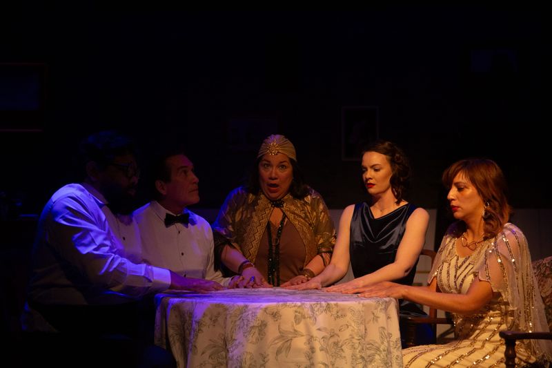 The cast of "Blithe Spirit" acts in a scene involving a séance during a dress rehearsal at Aurora Arts Theatre in Corpus Christi on March 18.