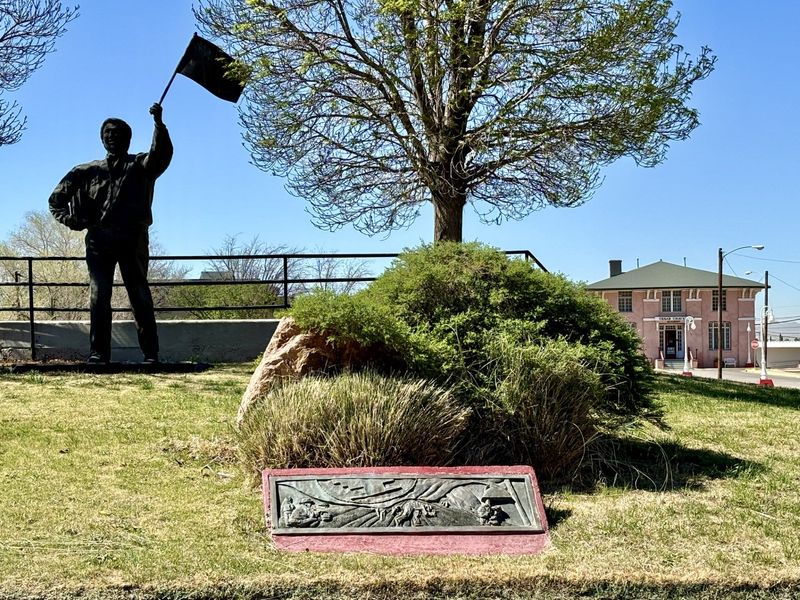 A statue of labor leader Cesar Chavez stands outside of Cesar Chavez Academy in El Paso. Calls are mounting for the name of the school to be changed after allegations of sexual abuse by Chavez were reported.