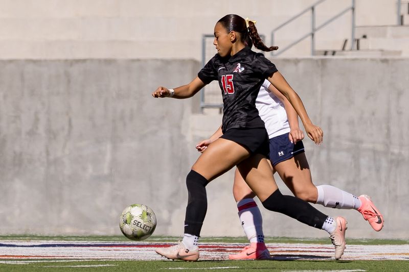 Americas’ Zaryha Wheeler (15) kicks the ball against Chapin during a Class 5A Division I girls soccer playoff game Thursday, March 19, 2026, at SAC 2 in El Paso, Texas.
