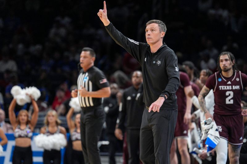 Texas A&M head coach Bucky McMillan signals to his players in the first half during a first round menâ€™s basketball game of the NCAA Tournament between St. Mary's and Texas A&M, at Paycom in Oklahoma City on Thursday, March 19, 2026.