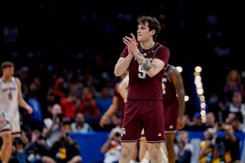 Mar 19, 2026; Oklahoma City, OK, USA; Texas A&M Aggies guard Ruben Dominguez (9) reacts during a first round game of the men's 2026 NCAA Tournament at Paycom Center. Mandatory Credit: Alonzo Adams-Imagn Images