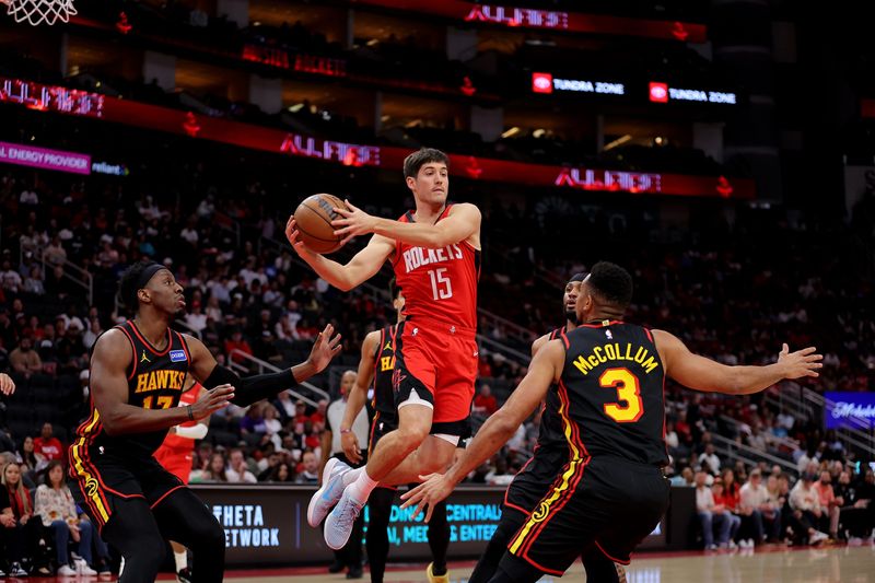 Mar 20, 2026; Houston, Texas, USA; Houston Rockets guard Reed Sheppard (15) drives to the basket against the Atlanta Hawks during the first quarter at Toyota Center. Mandatory Credit: Erik Williams-Imagn Images