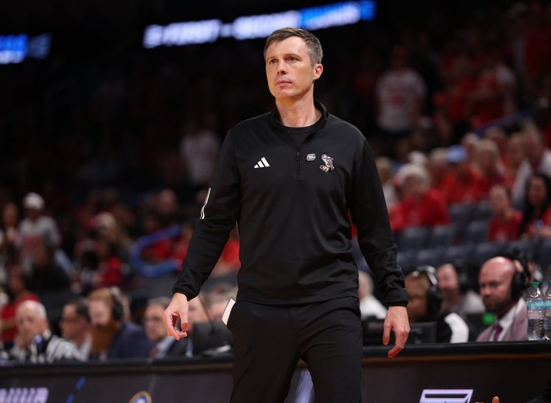 Mar 21, 2026; Oklahoma City, OK, USA; Texas A&M Aggies head coach Bucky McMillan stands on the sidelines during the second half against the Houston Cougars in a second round game of the men's 2026 NCAA Tournament at Paycom Center. Mandatory Credit: William Purnell-Imagn Images