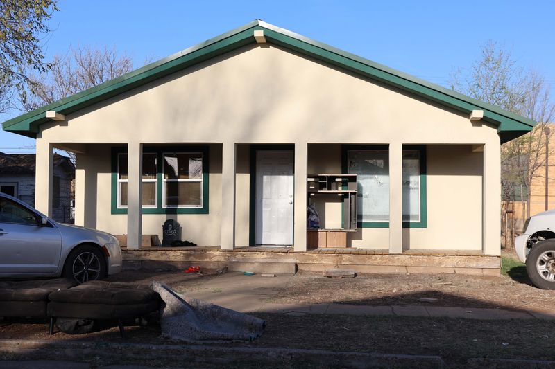 A house with bullet holes is seen in the 300 Block of South Mississippi Street in Amarillo, where a gunman opened fire toward the residence during a house party March 22. Two people were injured, and the suspect fled the scene.