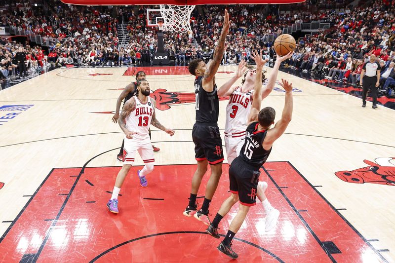 Mar 23, 2026; Chicago, Illinois, USA; Chicago Bulls guard Josh Giddey (3) shoots against the Houston Rockets during the first half at United Center. Mandatory Credit: Kamil Krzaczynski-Imagn Images