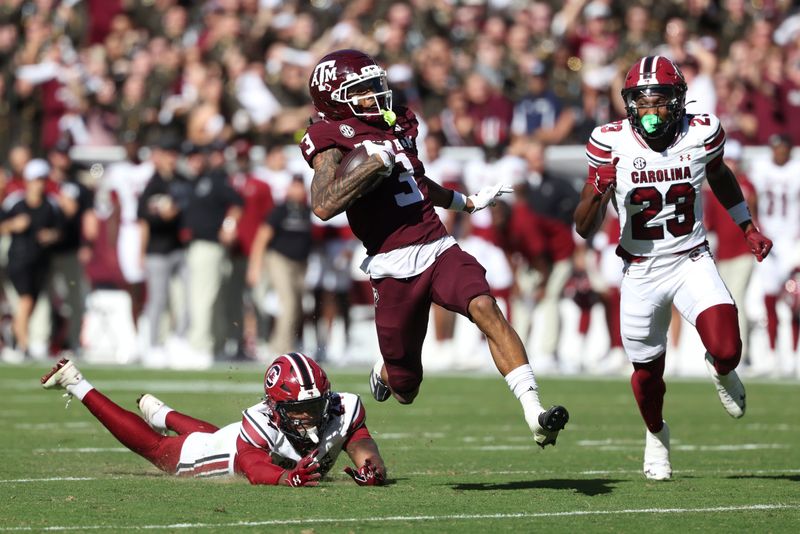Nov 15, 2025; College Station, Texas, USA; Texas A&M Aggies wide receiver Ashton Bethel-Roman (3) runs with the ball during the third quarter against the South Carolina Gamecocks at Kyle Field. Mandatory Credit: Troy Taormina-Imagn Images