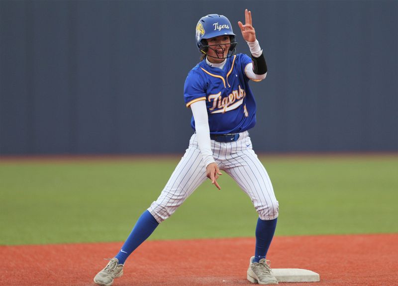 Frenship's Madison Cameron celebrates after hitting a double against Midland High in a District 2-6A softball game Friday, March 27, 2026, at the Frenship Athletic Complex in Wolfforth.