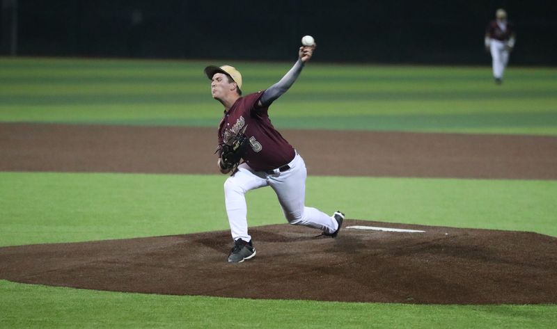 Tuloso-Midway's Everett Vernon delivers a pitch against Calallen on Friday, March 27, 2026 at Warrior Field.