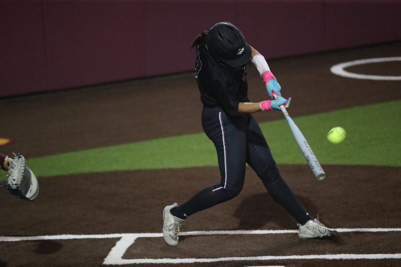 Calallen's Audryna Almaraz connects on a grand slam during Friday's District 31-4A game against Tuloso-Midway at Tuloso-Midway High School on Friday, March 27, 2026