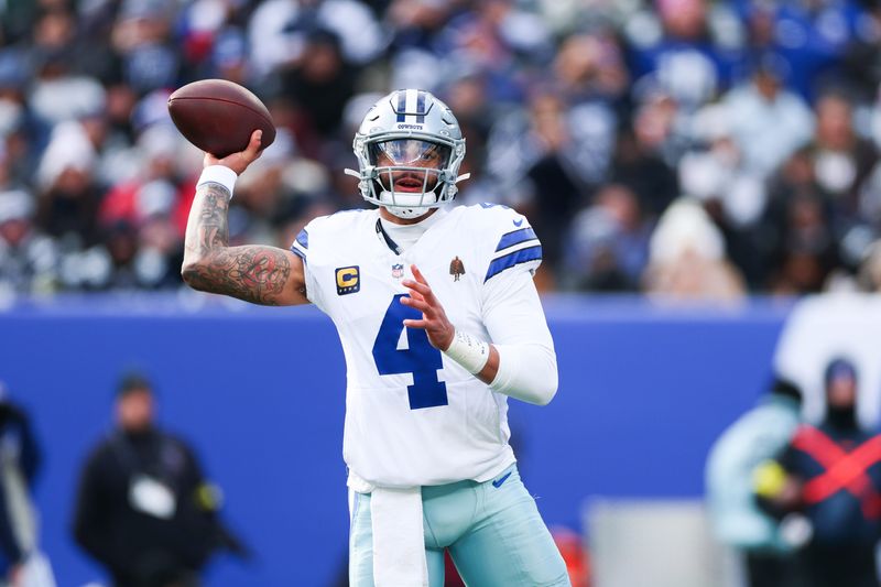 Jan 4, 2026; East Rutherford, New Jersey, USA; Dallas Cowboys quarterback Dak Prescott (4) looks to pass during the second quarter against the New York Giants at MetLife Stadium. Mandatory Credit: Vincent Carchietta-Imagn Images