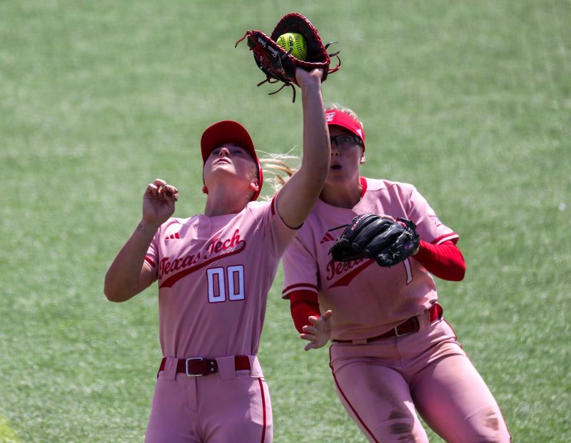 Texas Tech's Jackie Lis catches a pop fly in front of Mia Williams during a Big 12 Conference softball game, Sunday, March 29, 2026, at Tracy Sellers Field.