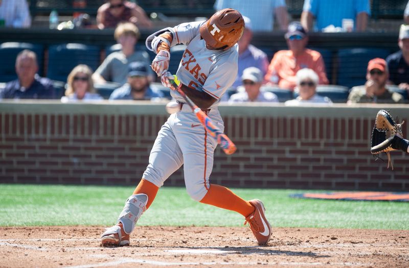 Texas Longhorns' Anthony Pack Jr. (6) swings at the ball as Auburn Tigers take on Texas Longhorns at Plainsman Park in Auburn, Ala. on Sunday, March 22, 2026.