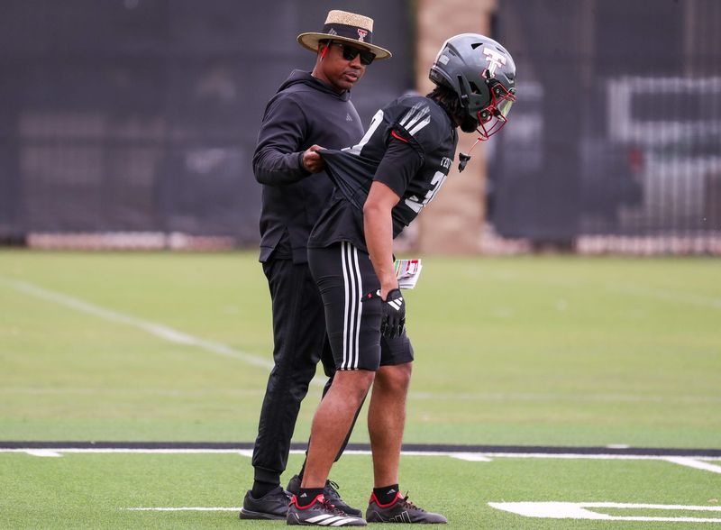 Texas Tech corner backs coach Darcel McBath leads a drill during spring football practice, Tuesday, March 31, 2026, at the Womble Football Center.