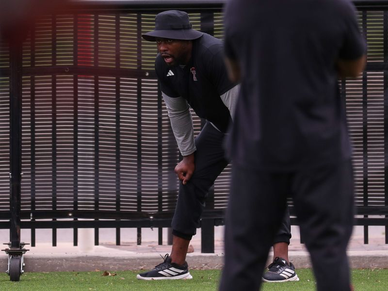 Texas Tech outside linebackers coach Jacquies Smith leads a drill during spring football practice, Tuesday, March 31, 2026, at the Womble Football Center.
