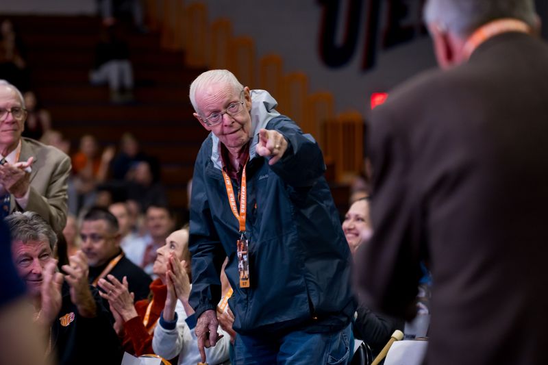 Louis Baudoin and Togo Riley, members of Texas Western’s 1966 championship team, point at each other as they are introduced before a “Glory Road” screening inside Memorial Gym on April 1, marking 20 years of the film and 60 years since Texas Western’s historic NCAA title.