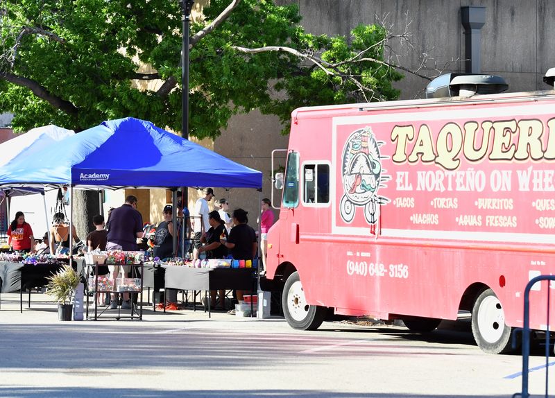 Food trucks park on the street during the After Hours Artwalk on April 2 in downtown Wichita Falls. The once-a-month event is hosted by the Wichita Falls Alliance for Arts and Culture and includes food vendors, aspiring artists and music.
