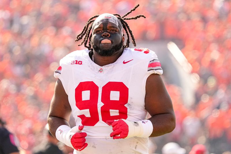 Ohio State Buckeyes defensive lineman Kayden McDonald (98) takes the field for the NCAA football game against the Illinois Fighting Illini at Gies Memorial Stadium in Champaign on Oct. 11, 2025.