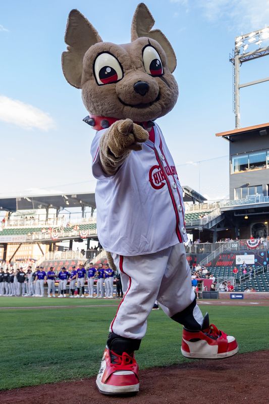 Chico, the Chihuahuas’ mascot, entertains fans on the field at Southwest University Park in El Paso, Texas, before the home opener on April 7, 2026.
