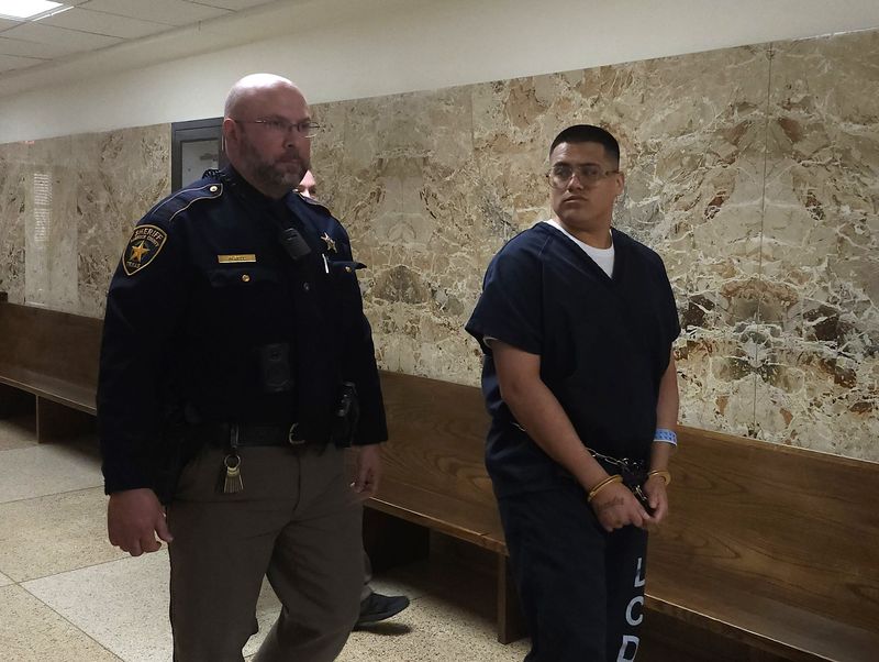 Justin Aleman, 27, appeared Thursday in the 364th District Court where he was sentenced to 50 years in prison after pleading guilty to murder in the Sept. 10, 2024, shooting deaths of his uncle, his uncle's girlfriend and their dog.
