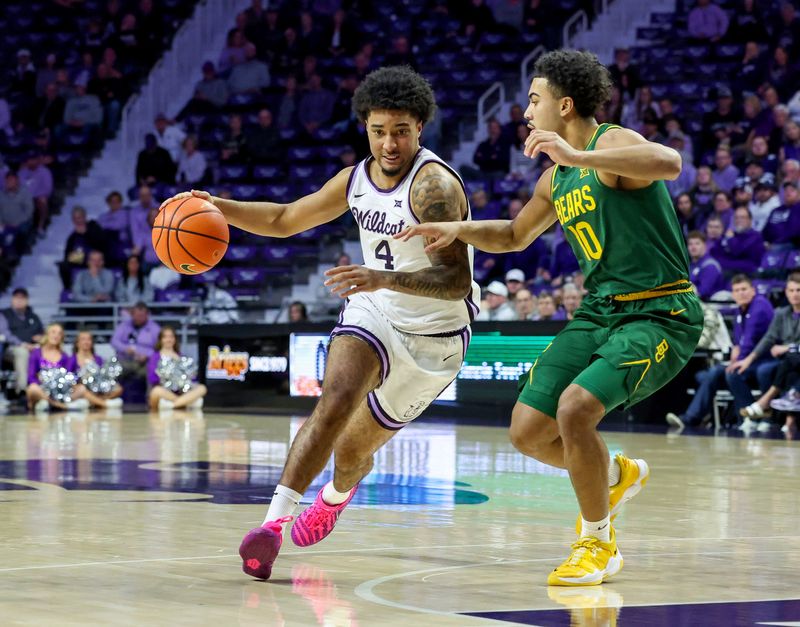 Feb 17, 2026; Manhattan, Kansas, USA; Kansas State Wildcats guard P.J. Haggerty (4) is guarded by Baylor Bears guard Isaac Williams IV (10) during the first half at Bramlage Coliseum. Mandatory Credit: Scott Sewell-Imagn Images