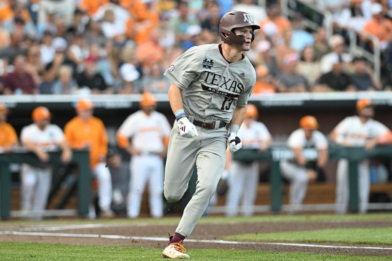 Jun 22, 2024; Omaha, NE, USA; Texas A&M Aggies left fielder Caden Sorrell (13) drives in a run against the Tennessee Volunteers during the first inning at Charles Schwab Field Omaha. Mandatory Credit: Steven Branscombe-USA TODAY Sports