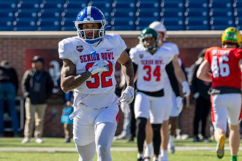 Jan 28, 2026; Mobile, AL, USA; National Team running back Seth McGowan (32) of Kentucky practices during National Senior Bowl practice at Hancock Whitney Stadium. Mandatory Credit: Vasha Hunt-Imagn Images