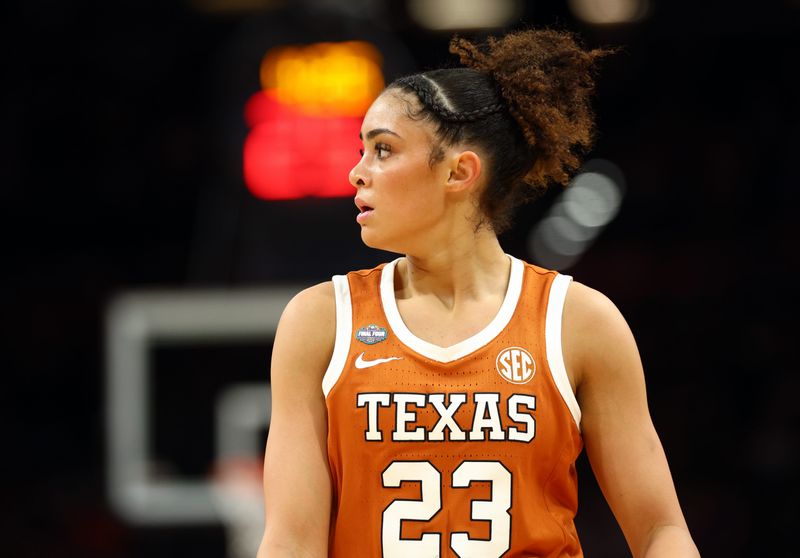 Apr 3, 2026; Phoenix, AZ, USA; Texas Longhorns guard Aaliyah Crump (23) against the UCLA Bruins during a semifinal of the Final Four of the women's 2026 NCAA Tournament at Mortgage Matchup Center. Mandatory Credit: Mark J. Rebilas-Imagn Images
