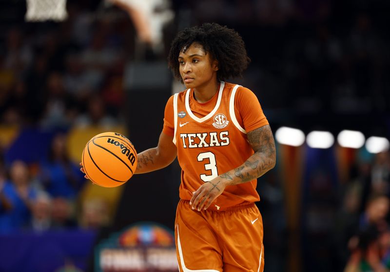Apr 3, 2026; Phoenix, AZ, USA; Texas Longhorns guard Rori Harmon (3) against the UCLA Bruins during a semifinal of the Final Four of the women's 2026 NCAA Tournament at Mortgage Matchup Center. Mandatory Credit: Mark J. Rebilas-Imagn Images