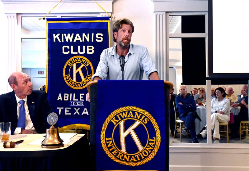 Lancium CEO and co-founder Michael McNamara describes the progress of the Stargate Project buildout at the weekly Kiwanis Club of Abilene luncheon April 8. Beside him club President Randy Roewe listens with interest. The 10-building data center is scheduled to be completed in 2028