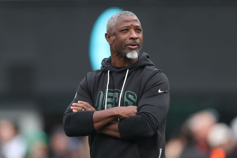 New York Jets head coach Aaron Glenn looks on before the game against the Miami Dolphins at MetLife Stadium.