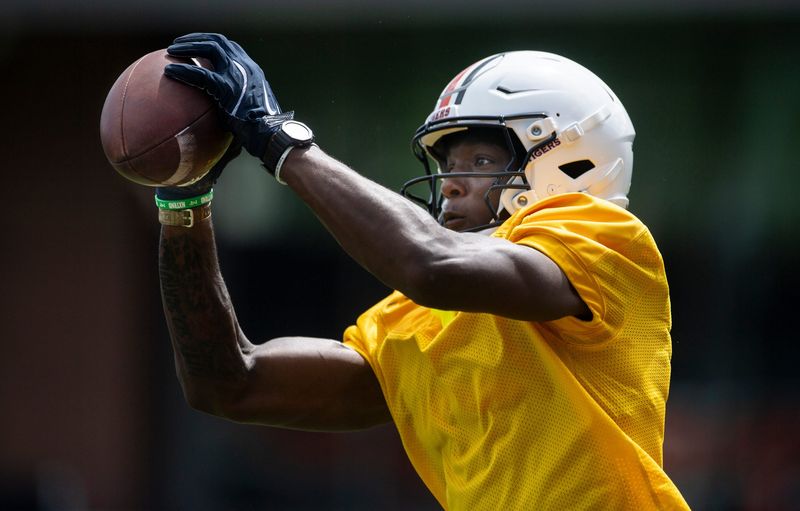 Auburn Tigers wide receiver Cam Coleman (8) catches the ball during practice at Woltosz Football Performance Center in Auburn, Ala. on Thursday, Aug. 14, 2025.