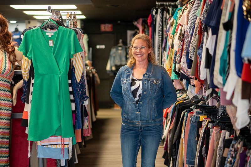Leslie Morgan, the owner and founder of Closet Connection, a women's upscale resale boutique, on April 14, 2026, at the storefront. Closet Connection offers women a sustainable option to sell used clothing items for cash, as well as an affordable, upscale boutique shopping experience.