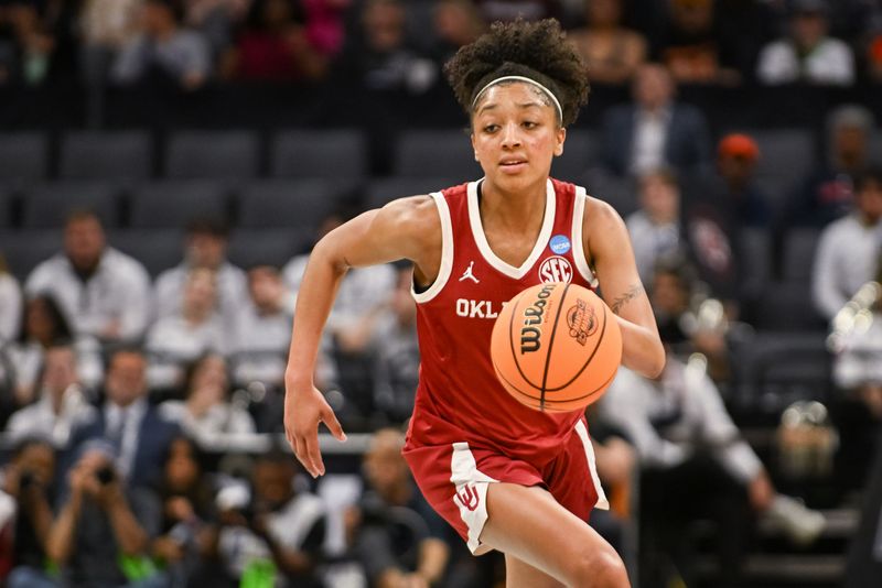 Mar 28, 2026; Sacramento, CA, USA; Oklahoma Sooners guard Zya Vann (3) controls the ball against the South Carolina Gamecocks in the Sweet Sixteen game of the Sacramento Regional 4 of the women's 2026 NCAA Tournament at Golden 1 Center. Mandatory Credit: Ed Szczepanski-Imagn Images