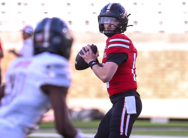 Kirk Francis looks to pass during the Texas Tech football team's spring game, Friday, April 17, 2026, at Jones AT&T Stadium.