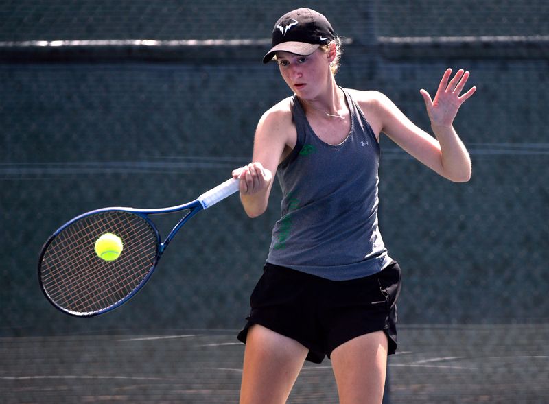 Wall sophomore Amelia Taylor returns a serve during the Region I-3A UIL Regional Tennis Meet at the Rose Park Tennis Center in Abilene Friday April 17, 2026.