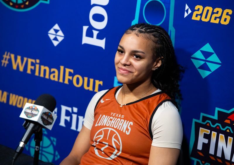 Apr 2, 2026; Phoenix, AZ, USA; Texas Longhorns guard Jordan Lee (7) during a locker room media availability during the Final Four National Semifinal practice at Mortgage Matchup Center. Mandatory Credit: Mark J. Rebilas-Imagn Images