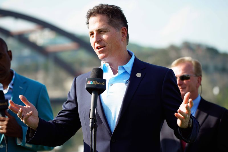 Mar 26, 2023; Austin, Texas, USA; Michael Saul Dell congratulates all players for participation during the final day of the World Golf Championships-Dell Technologies Match Play golf tournament. Mandatory Credit: Dustin Safranek-USA TODAY Sports