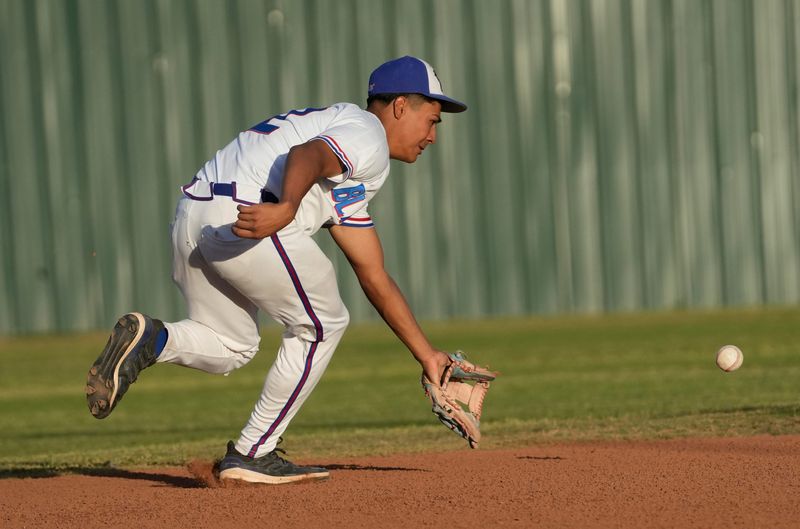 Americas' Drew Gonzalez, the shortstop, fields a ball against Hanks at Americas High School on April 21, 2026. Americas defeated Hanks 19-0.