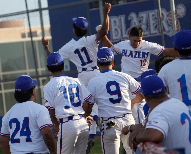 Drew Gonzalez celebrates with teammates after hitting a home run against Hanks at Americas High School on April 21, 2026. Americas defeated Hanks 19-0.