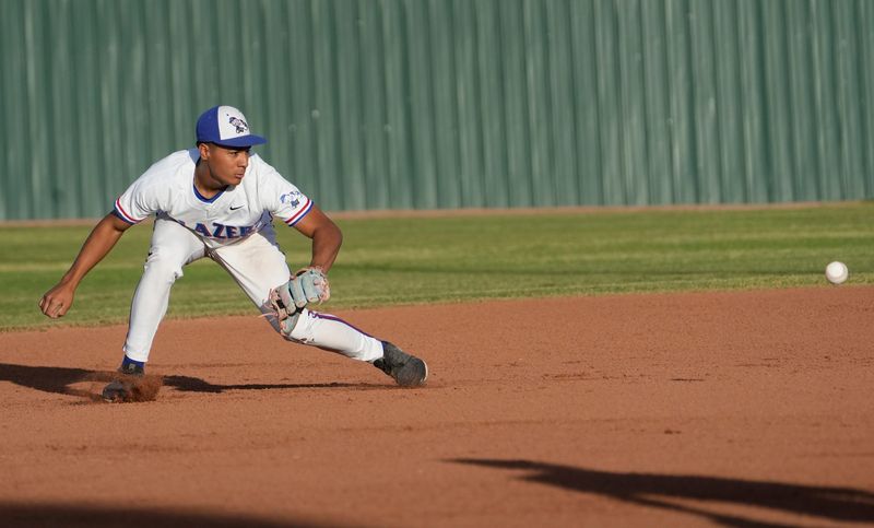 Americas' Drew Gonzalez, the shortstop, fields a ball against Hanks at Americas High School on April 21, 2026. Americas defeated Hanks 19-0.